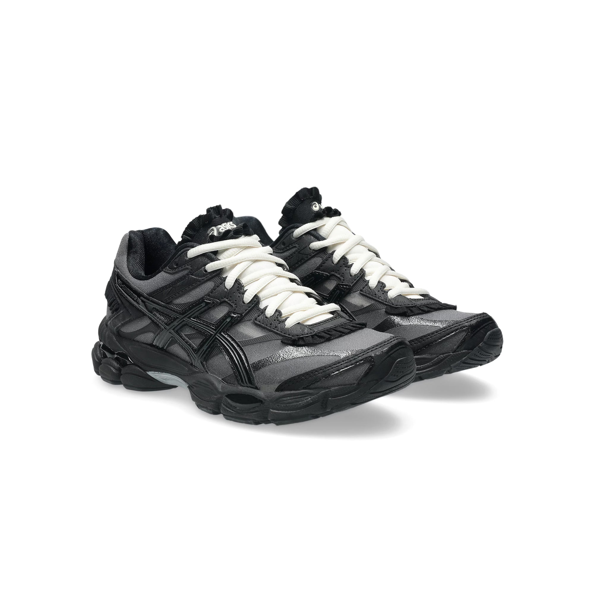 black and white sneakers on a white background