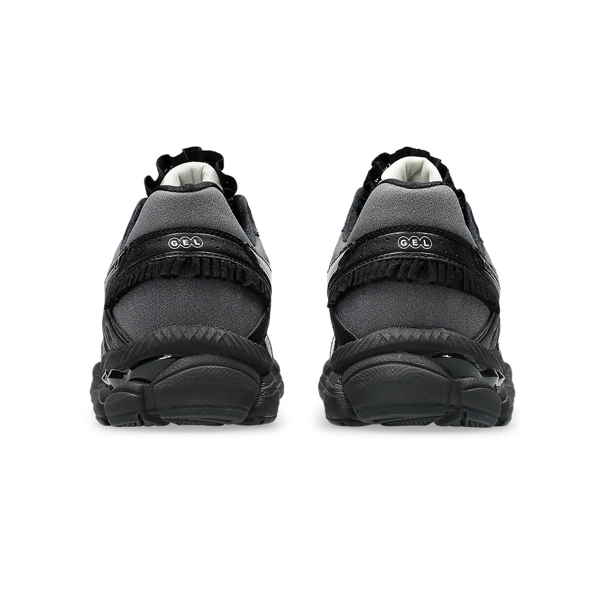 black and white sneakers on a white background