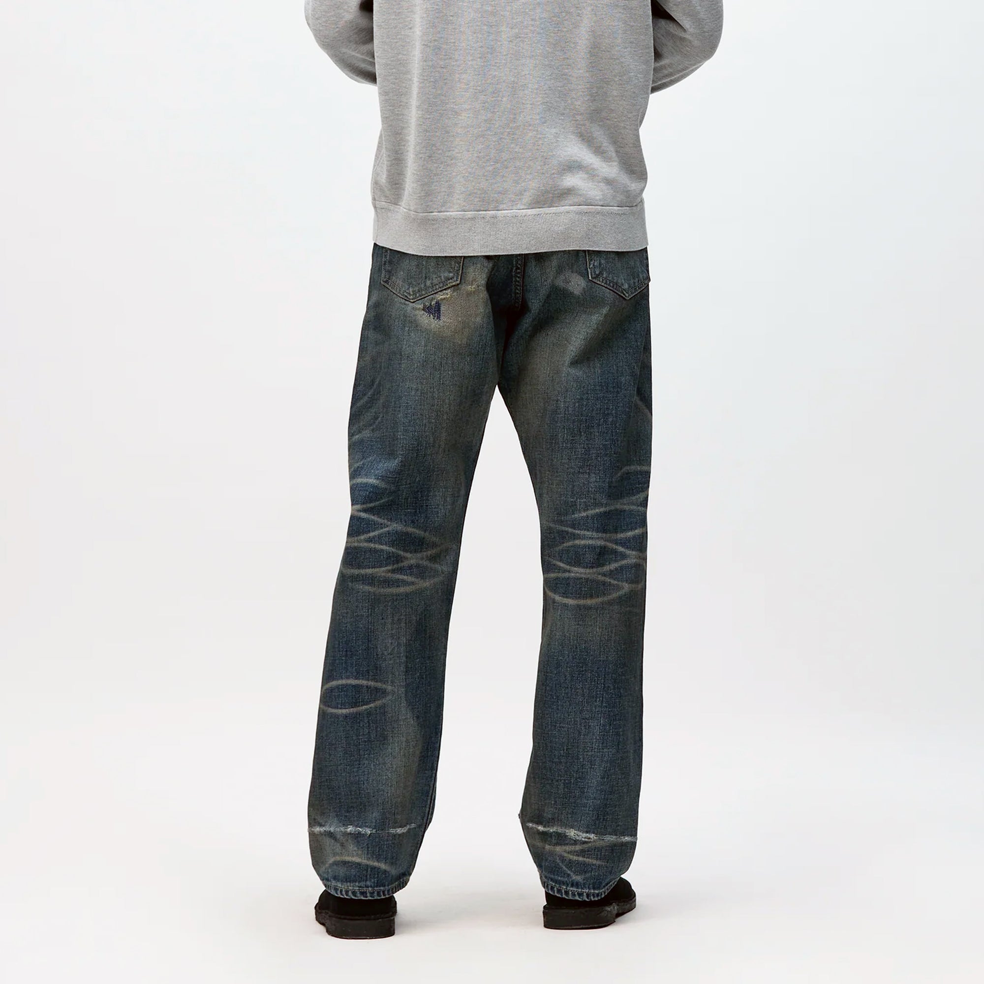 Indigo jeans on white background