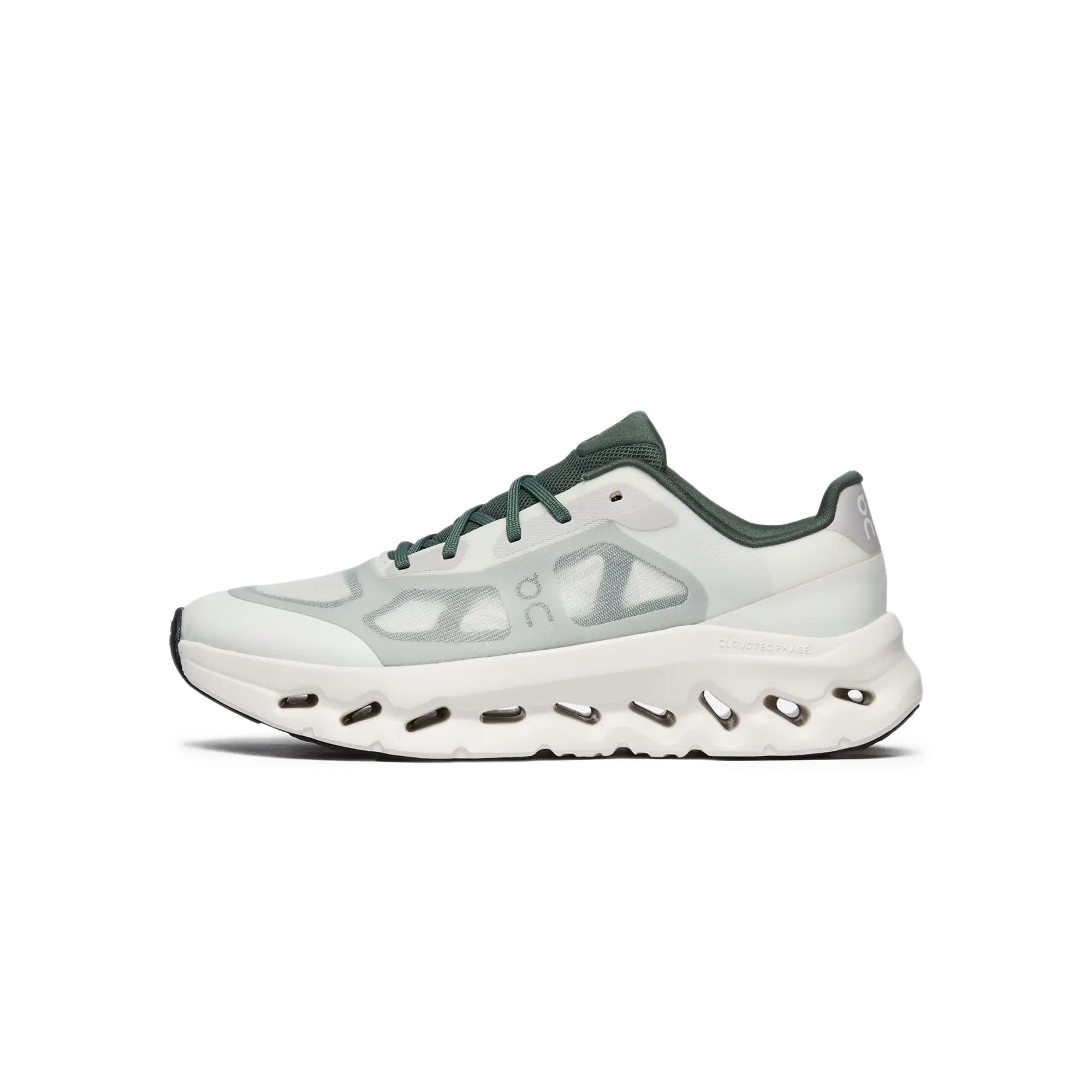 green & beige sneakers on a white background