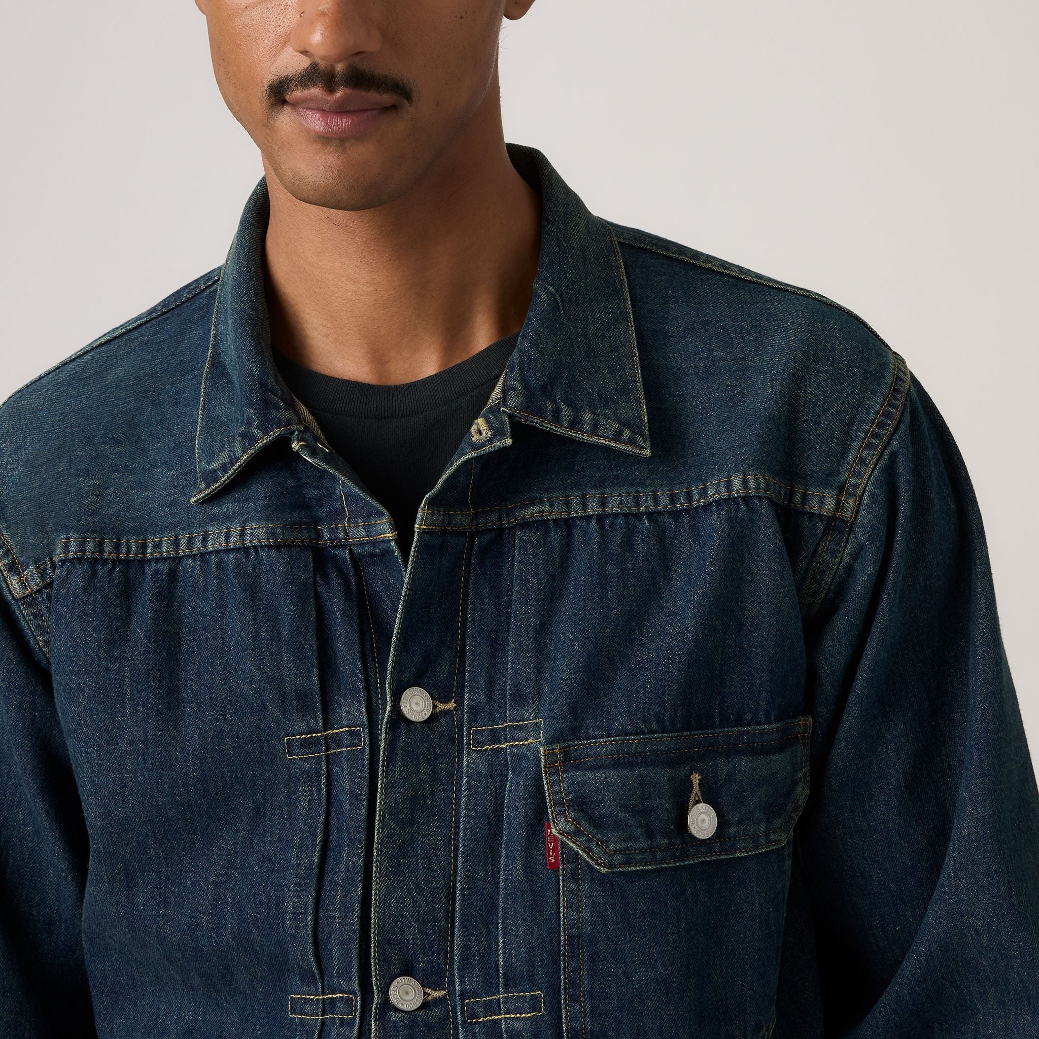 person wearing an Indigo Jacket on a white background