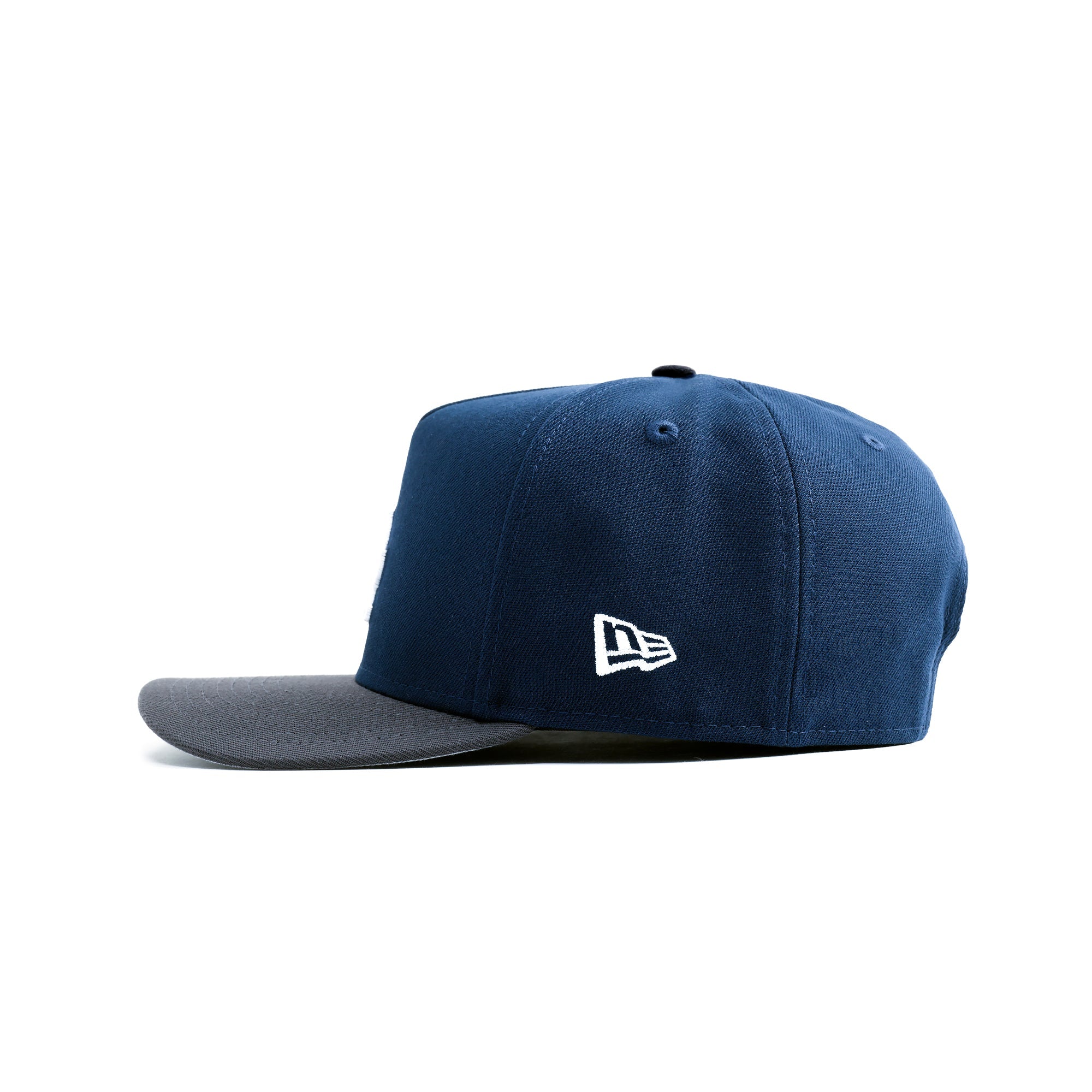 Navy blue cap with a white logo on a white background
