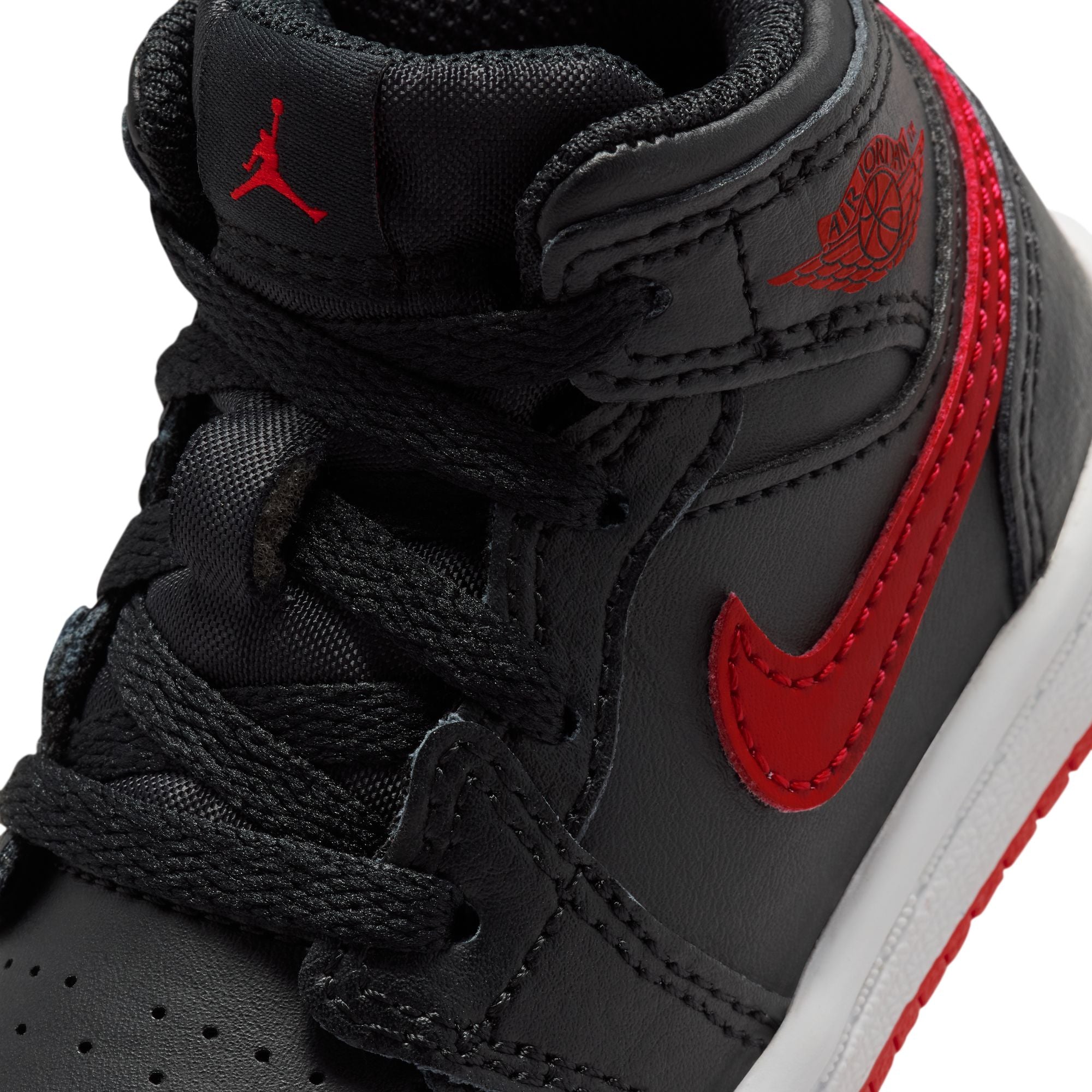Black/university Red-white Sneakers on a white background