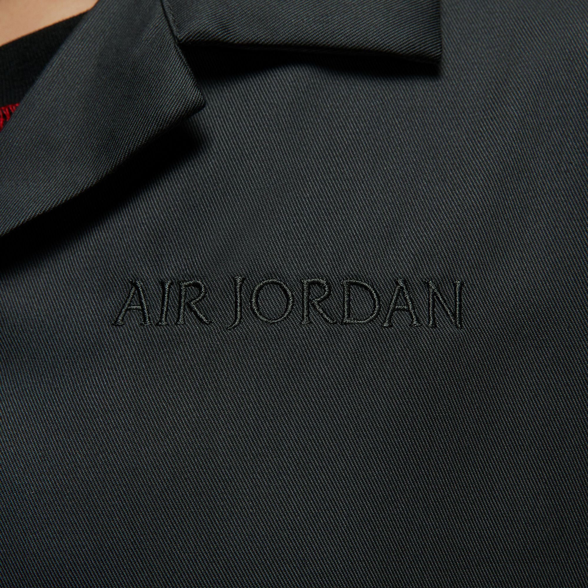 Air Jordan Womens Long Sleeve Woven Top
