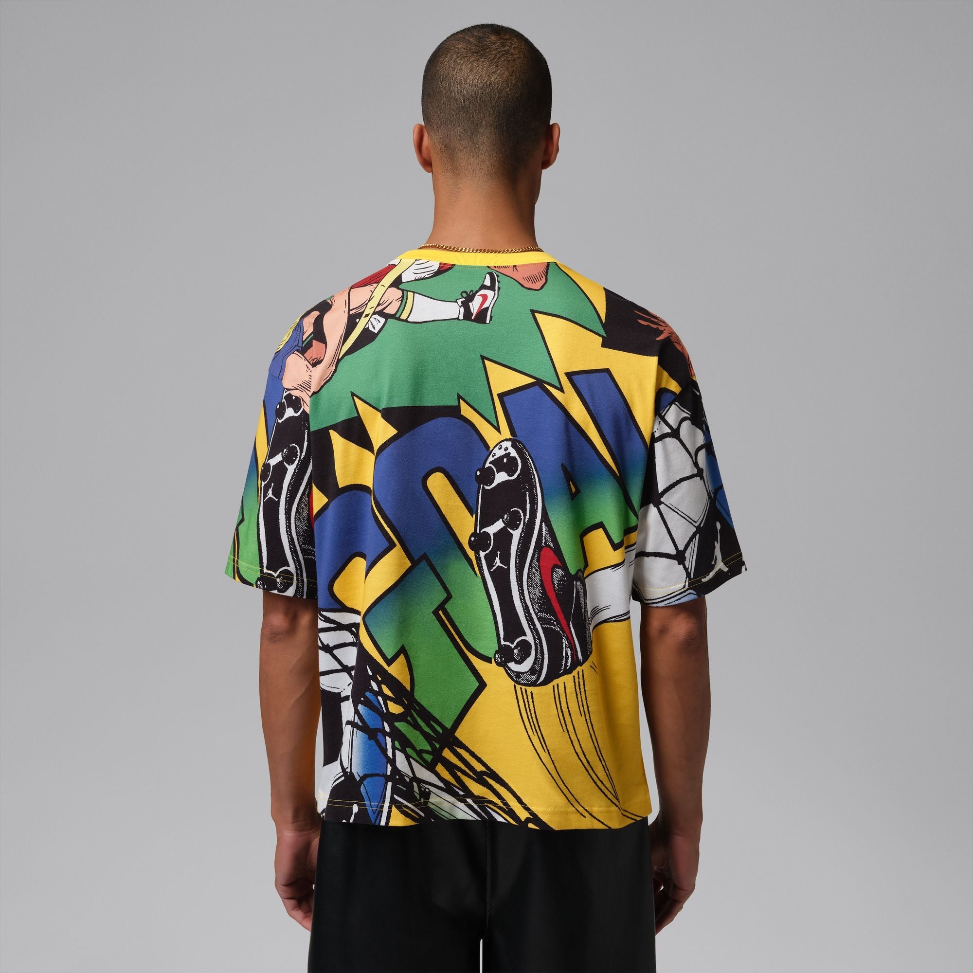 person wearing Varsity Maize T-shirt on a white background