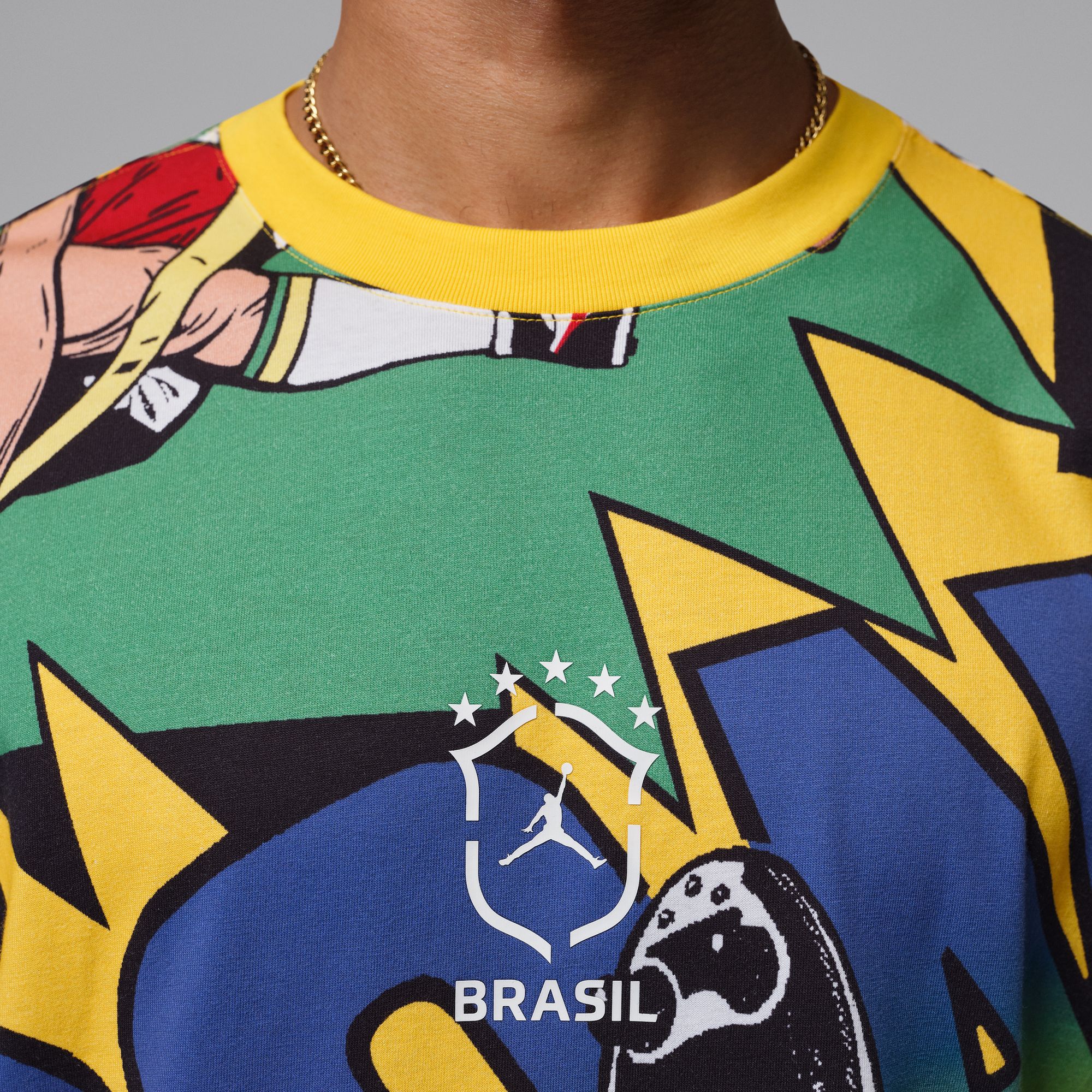 person wearing Varsity Maize T-shirt on a white background