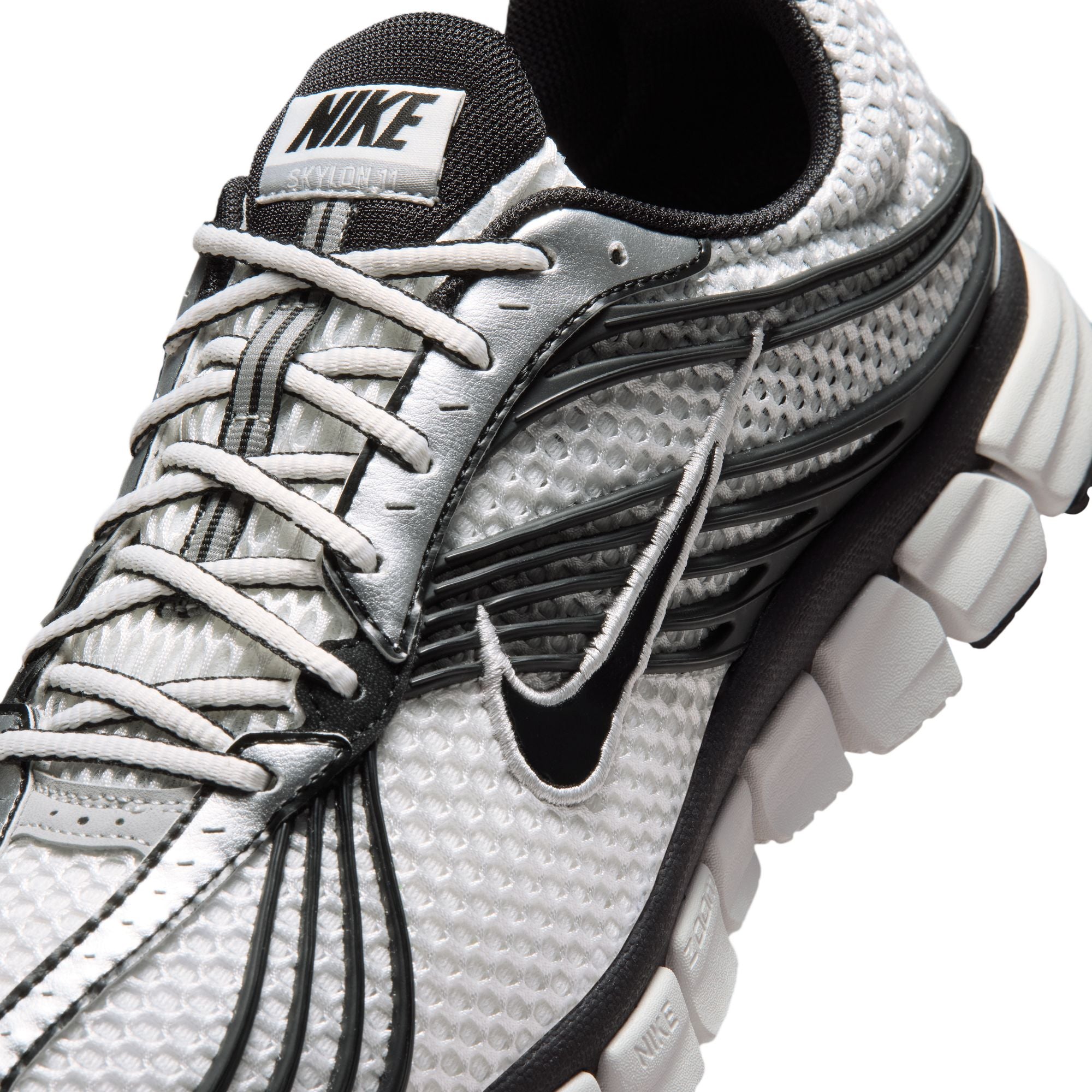white and black sneakers on a white background