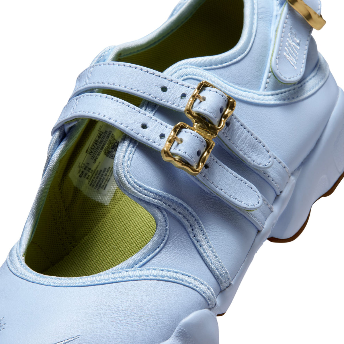blue brown and gold sneakers on a white background