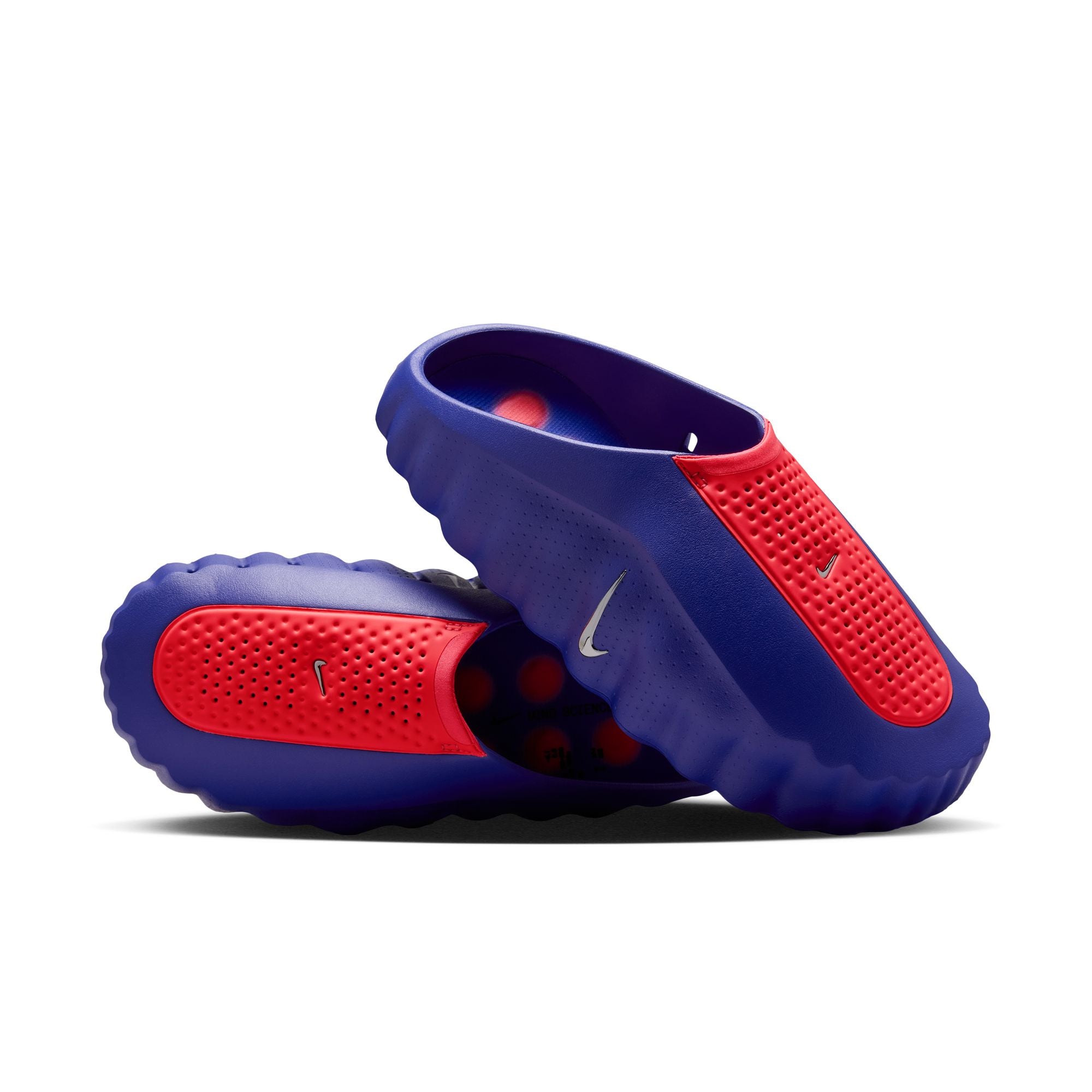 Indigo Burst/metalic Platinum-hyper Punch Mules on a white background