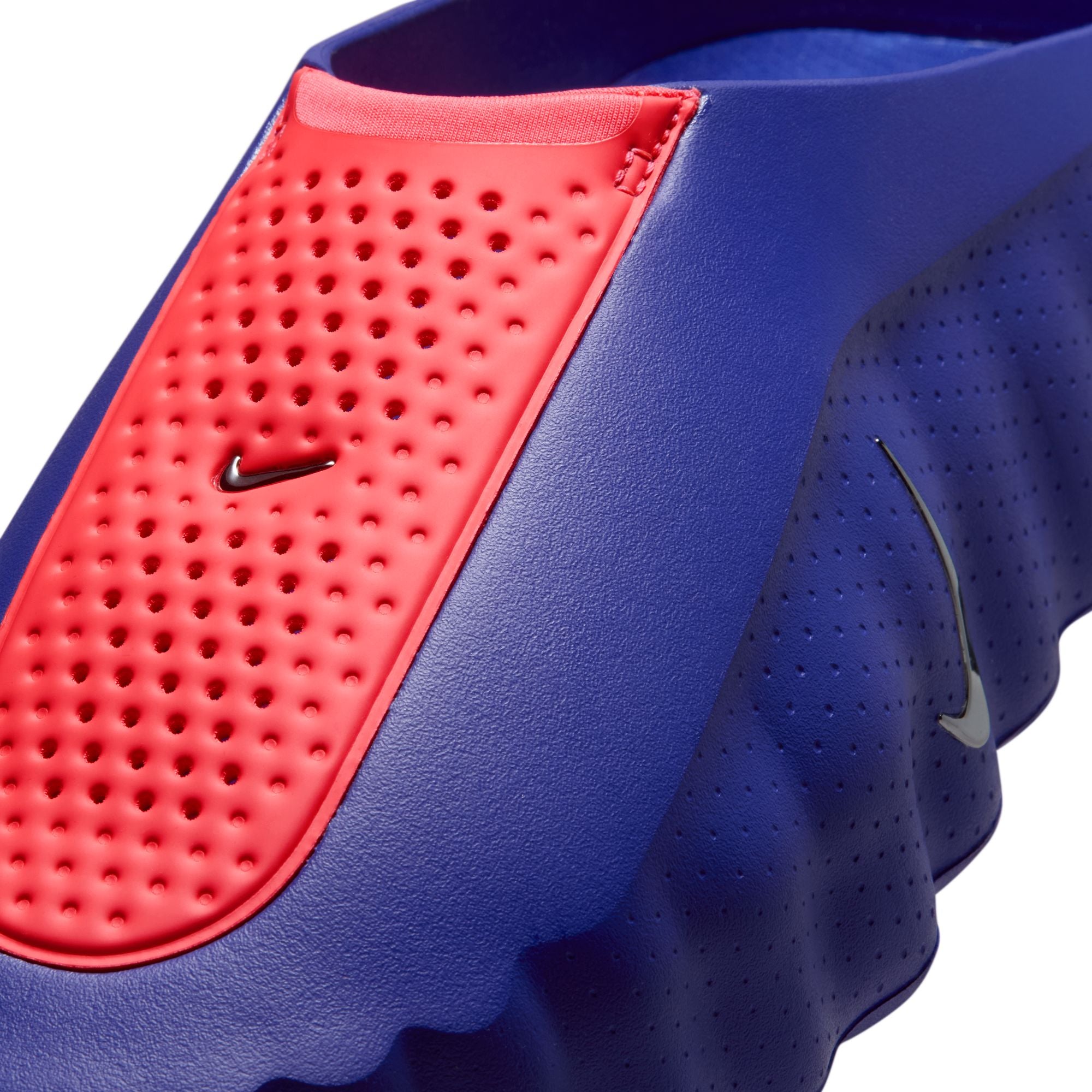Indigo Burst/metalic Platinum-hyper Punch Mules on a white background