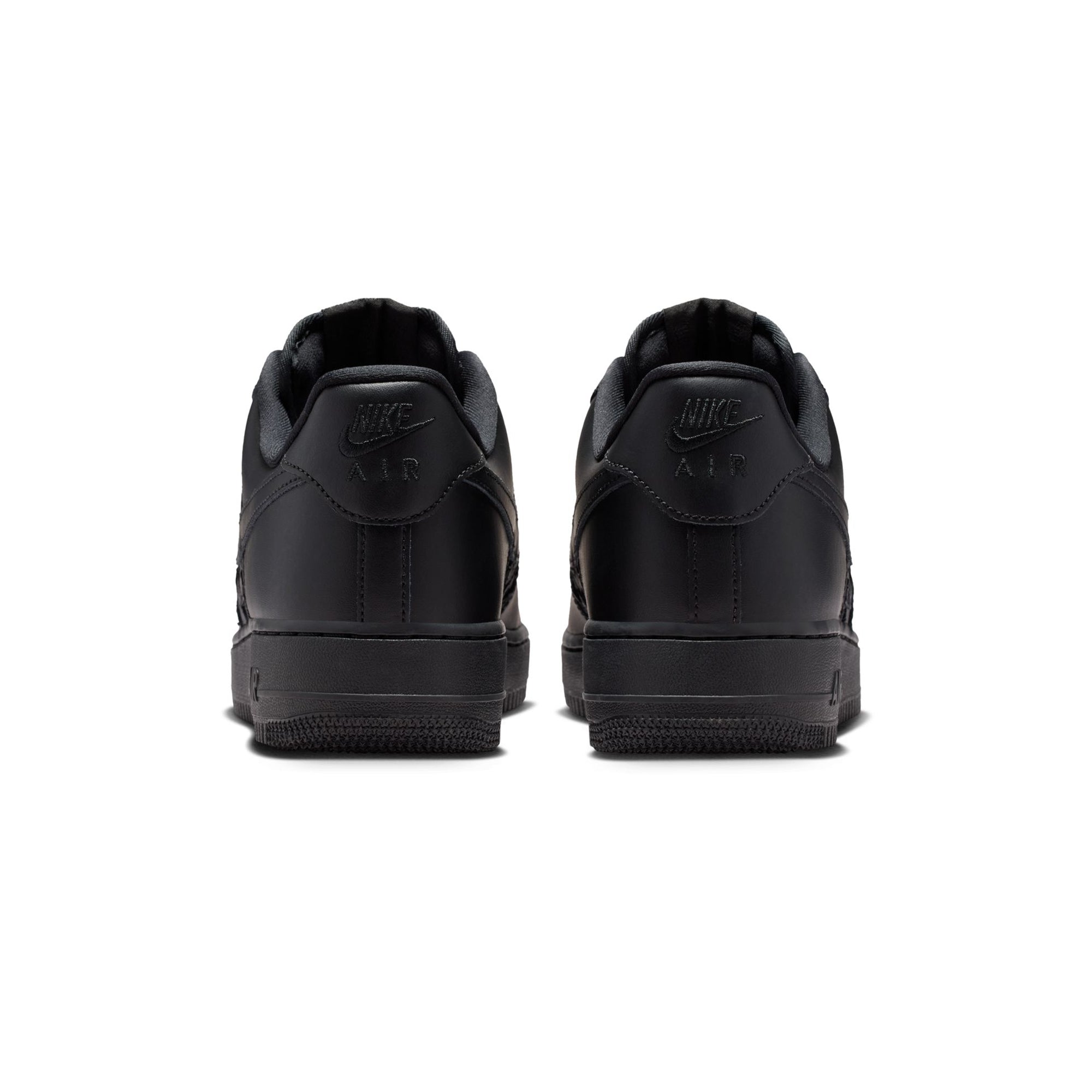 black sneakers on a white background