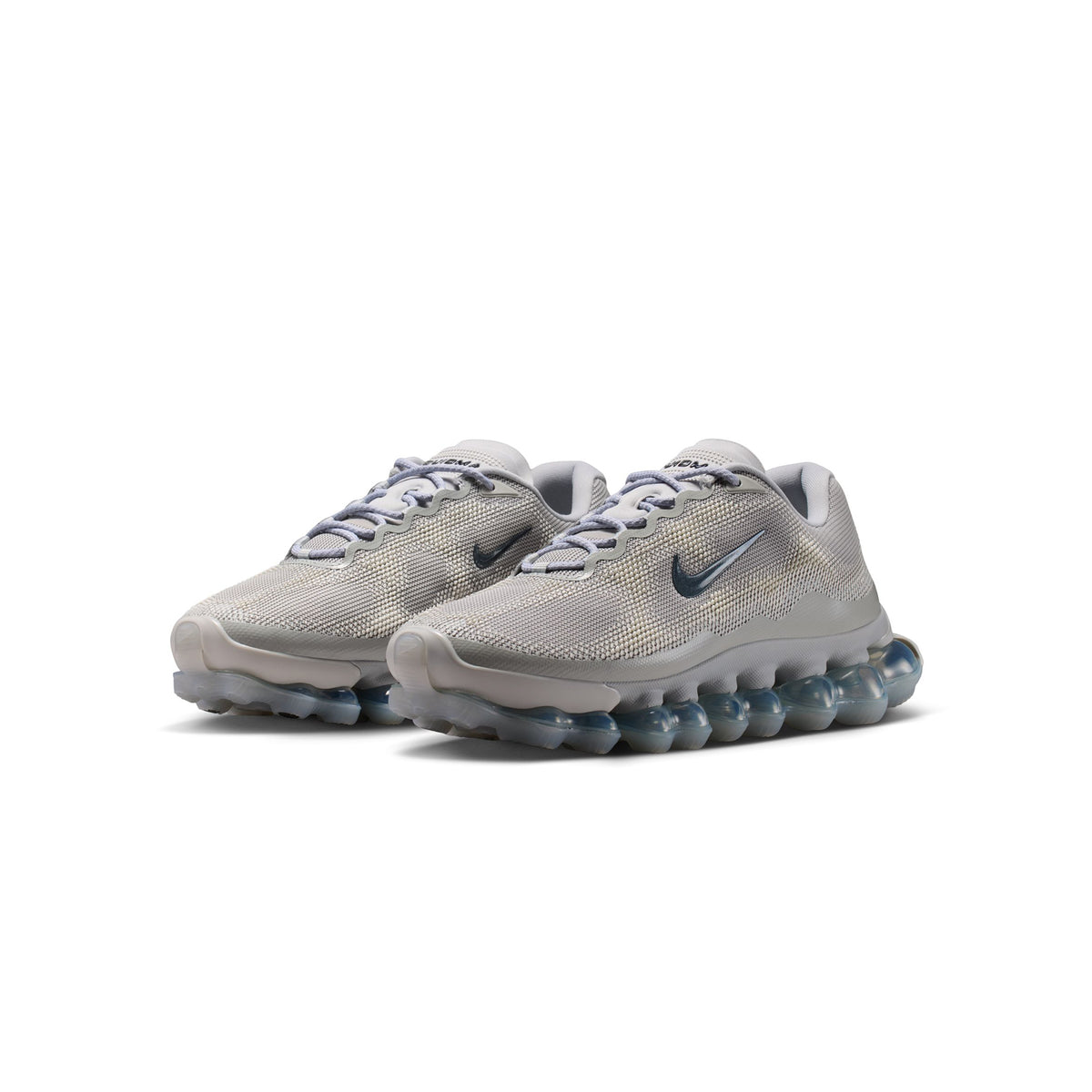 Dk Smoke Grey-platinum Tint Sneakers on a white background