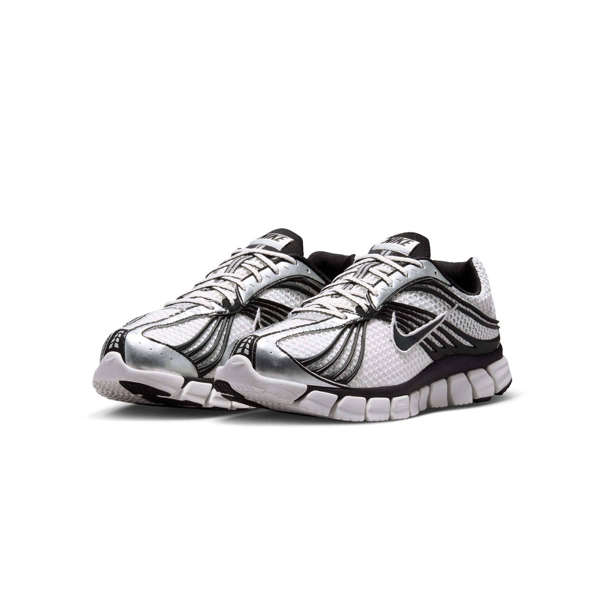 white and black sneakers on a white background