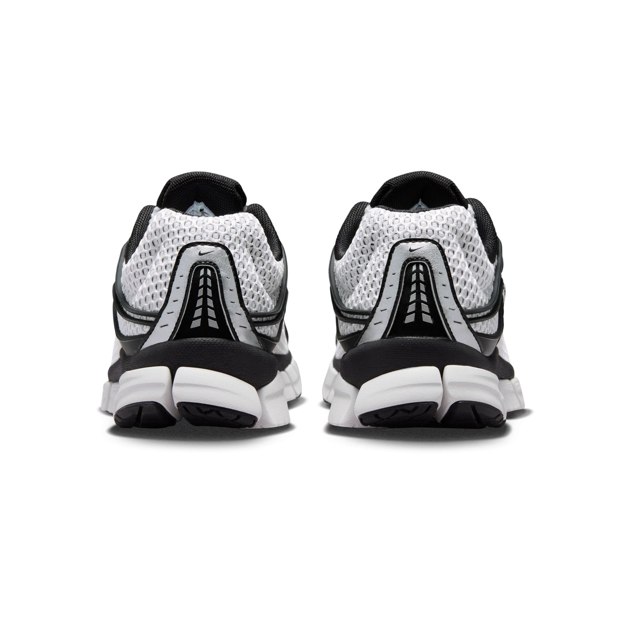 white and black sneakers on a white background