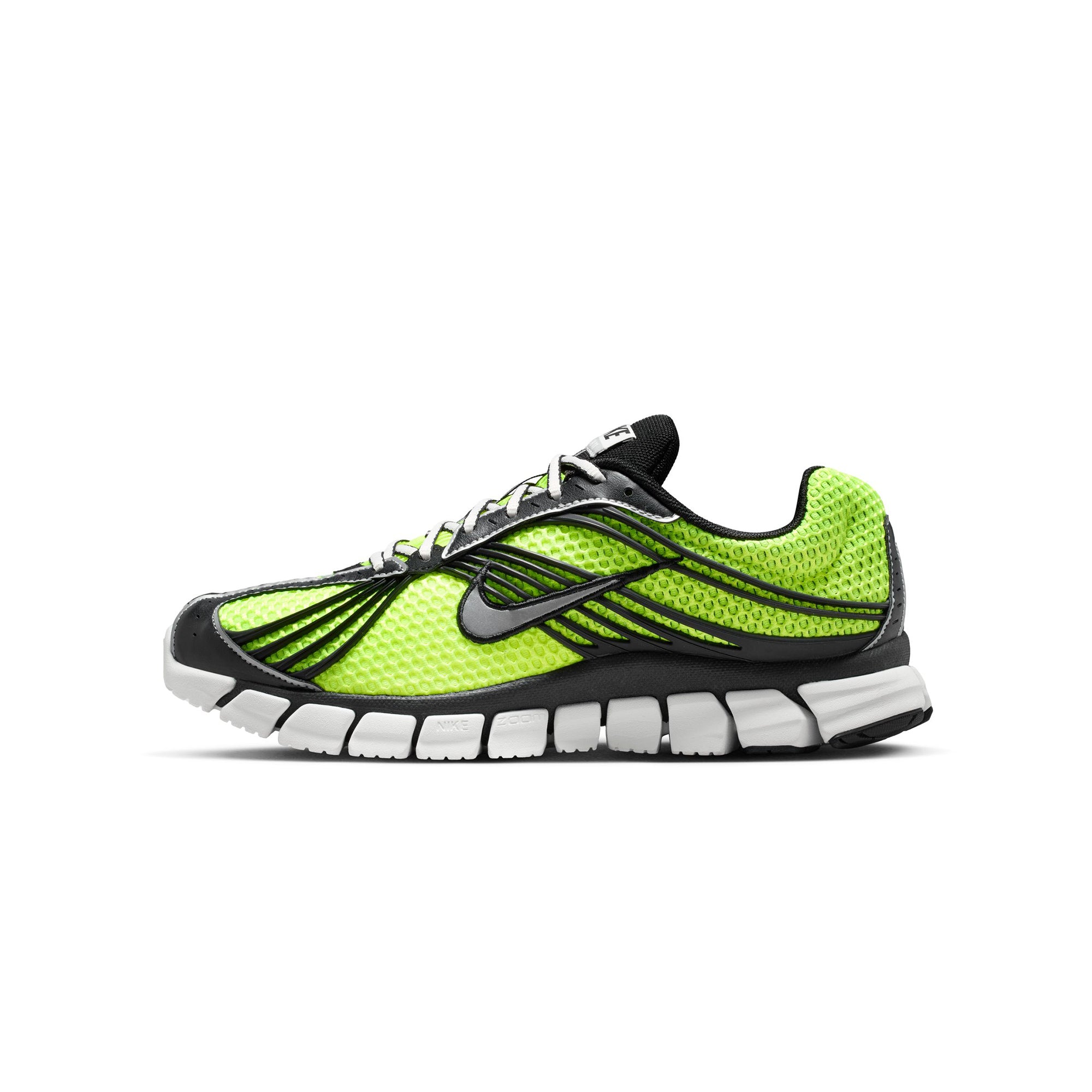 Volt green black and white sneakers on a white background