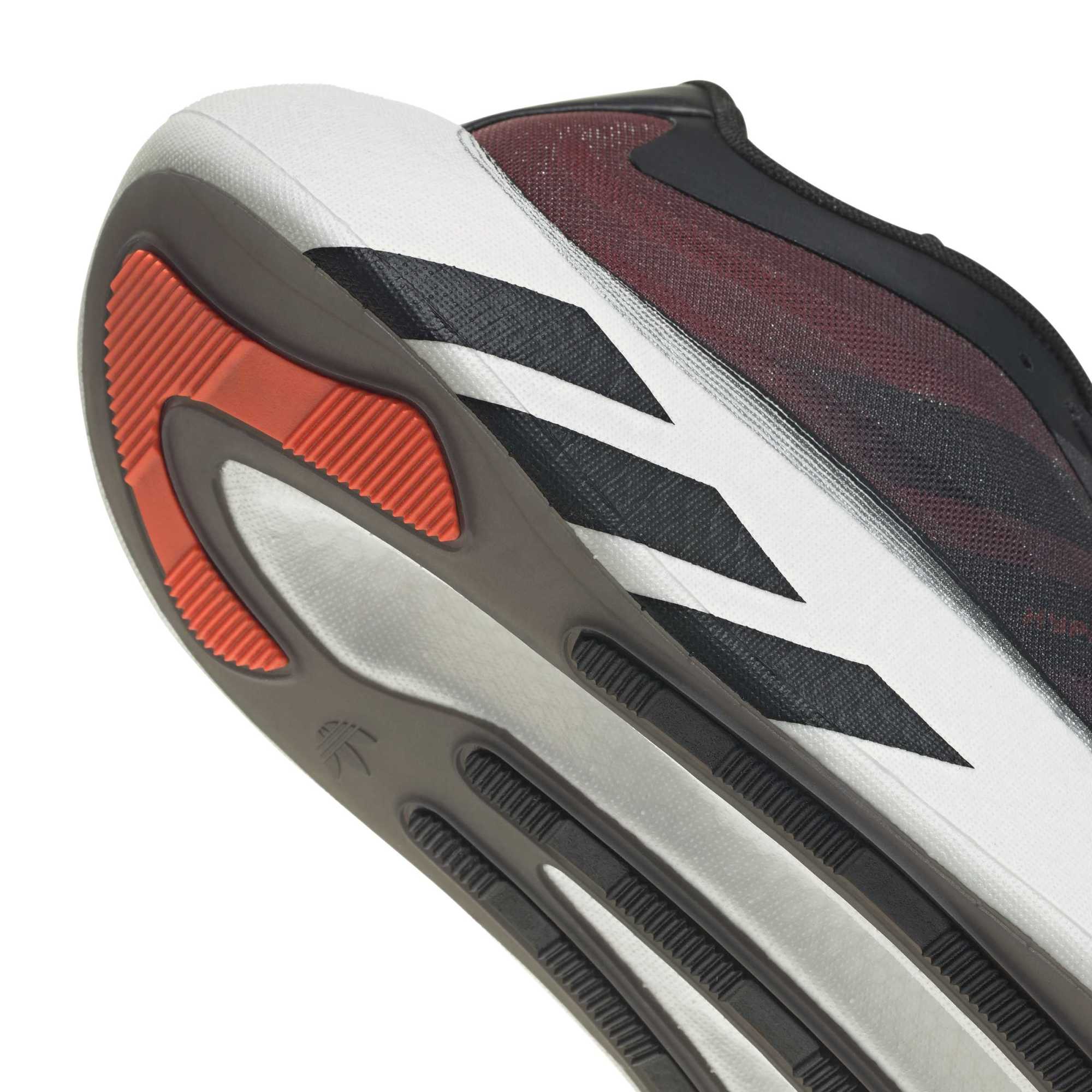 Core Black/ Solar Red/ White Sneakers on a white background