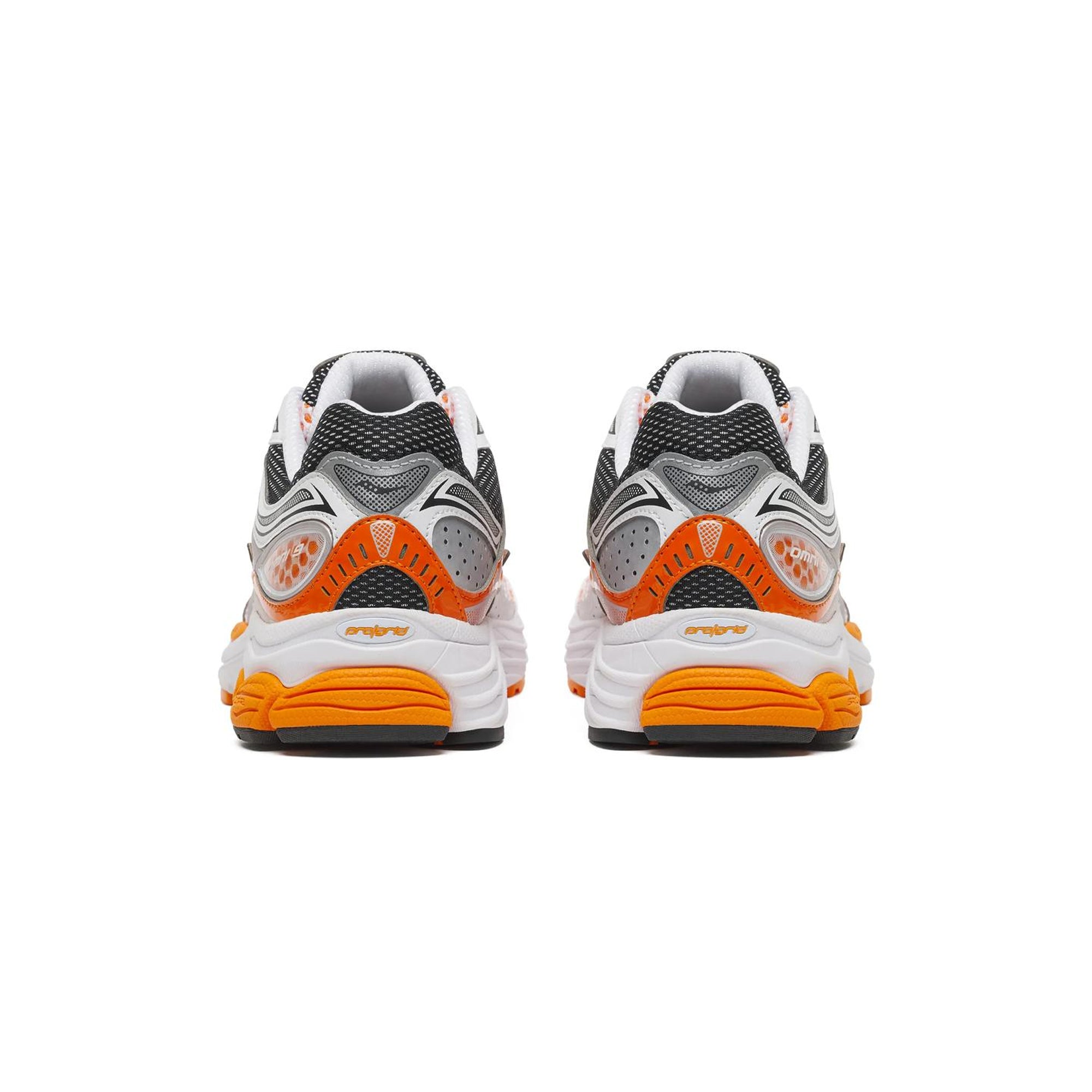 white orange black and silver sneakers on a white background