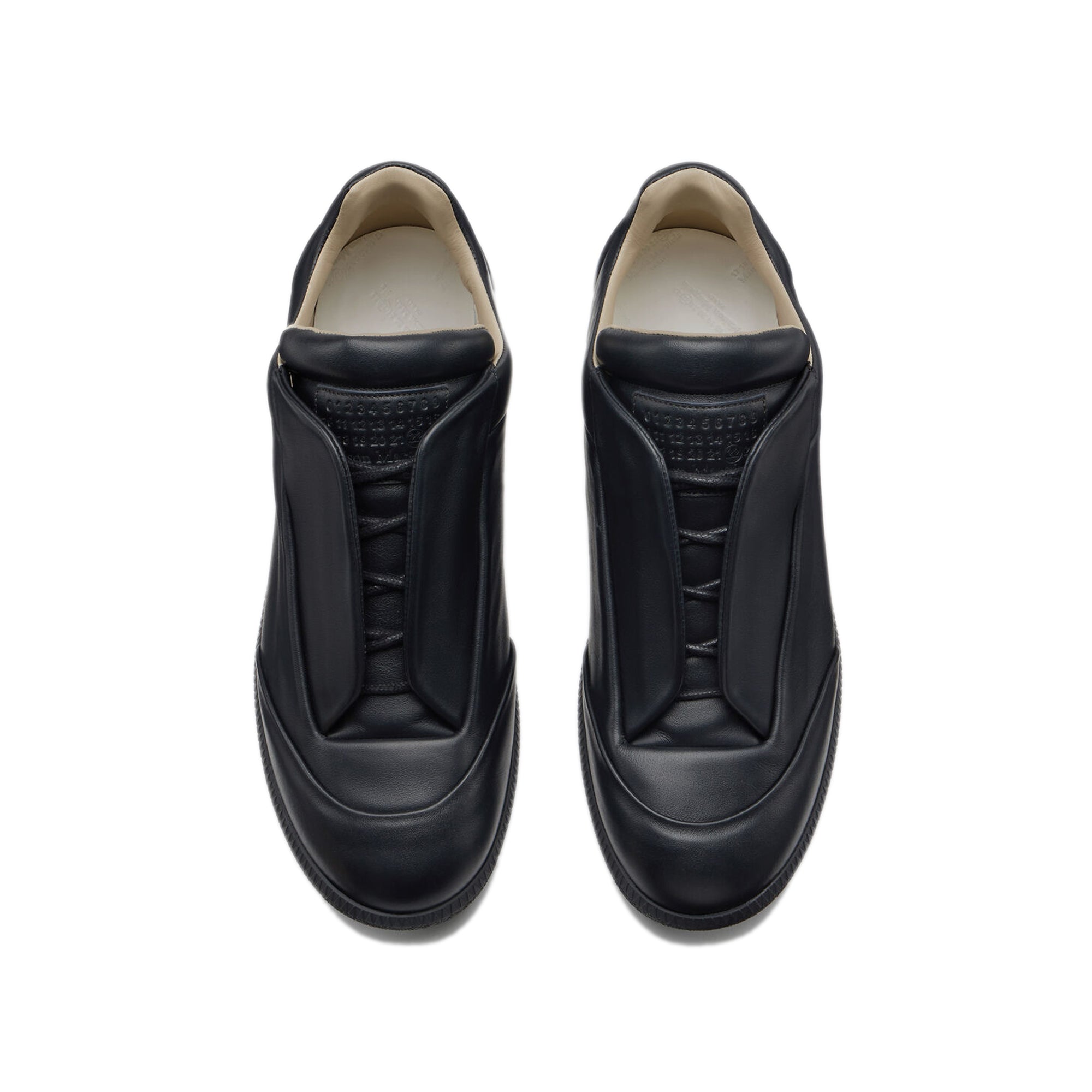black sneakers on a white background