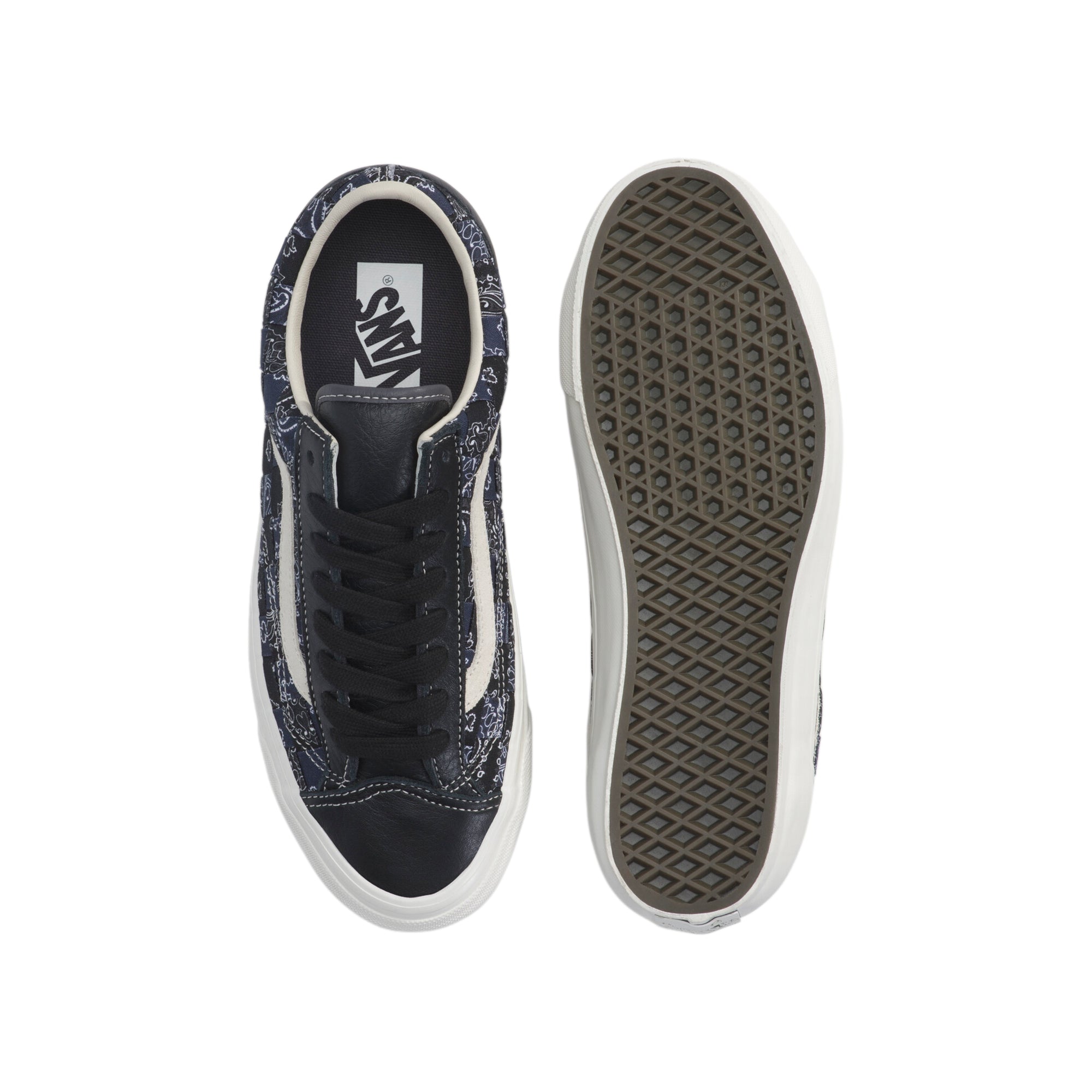 black white and blue sneakers on a white background