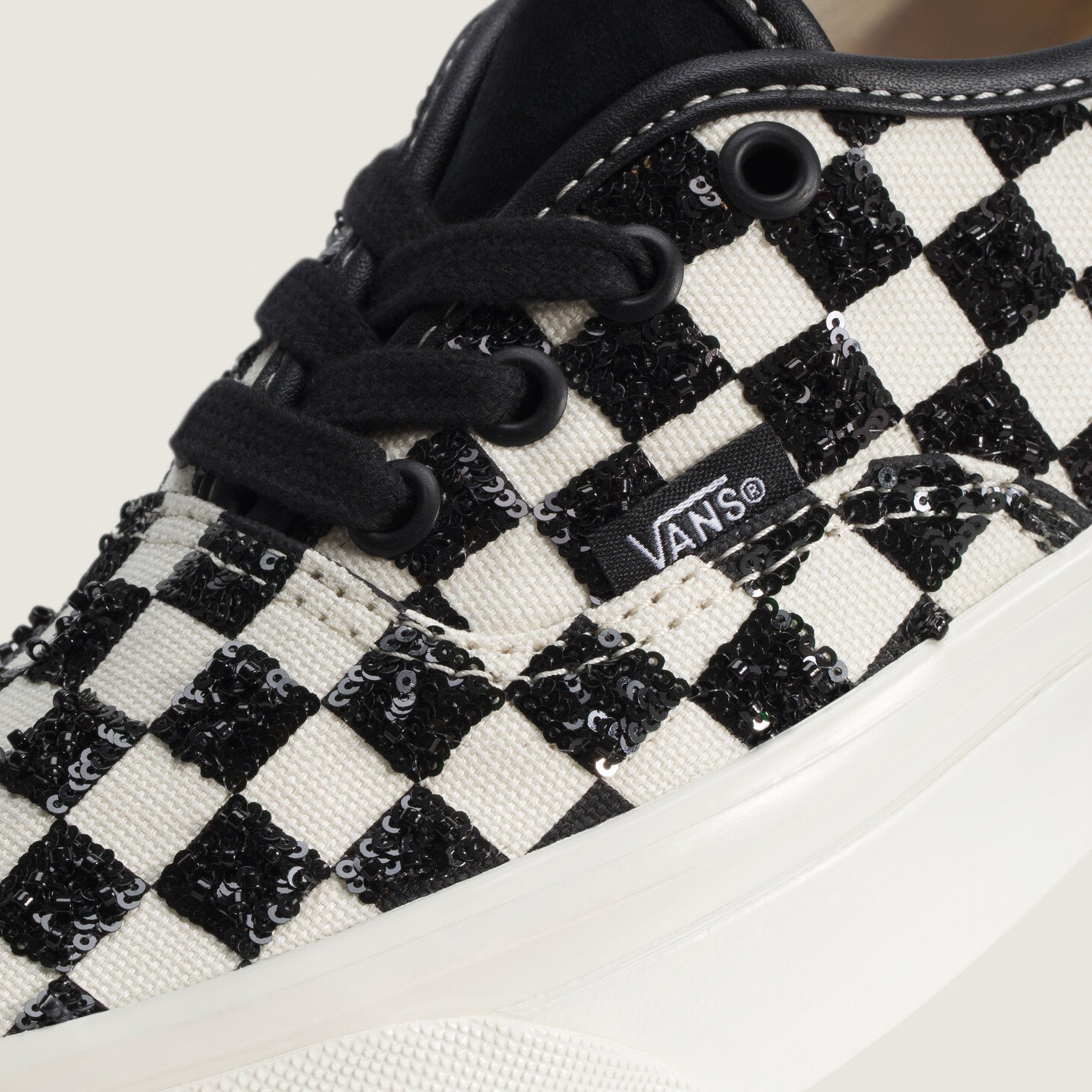 Checkerboard Black Sneakers on a white background